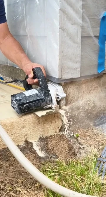 Controlled joint correction process at an existing concrete-to-structure condition.