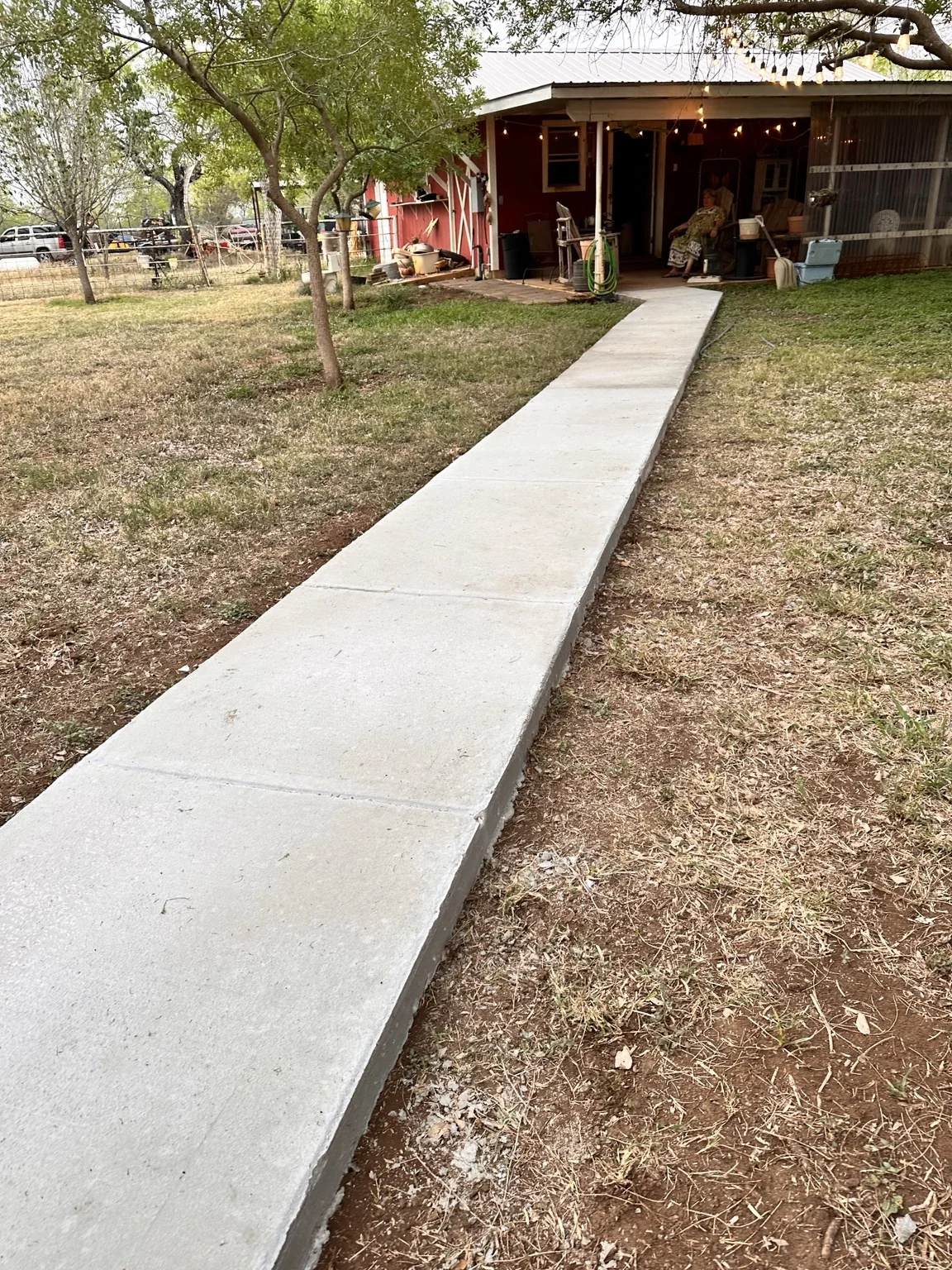 Long residential concrete walkway.