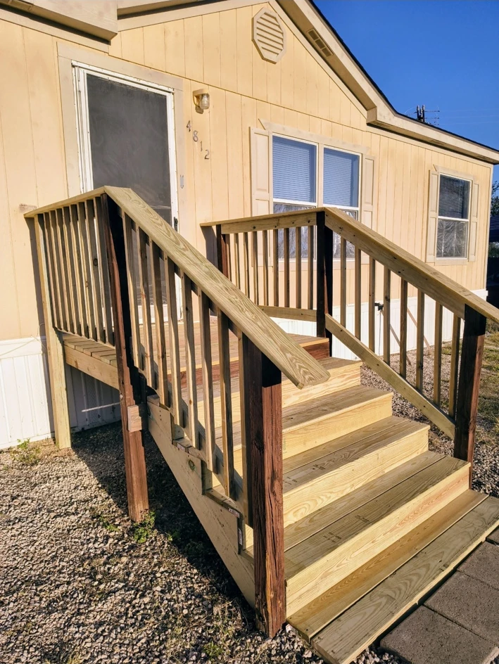 Exterior deck and stair repair adapted to the existing structure.