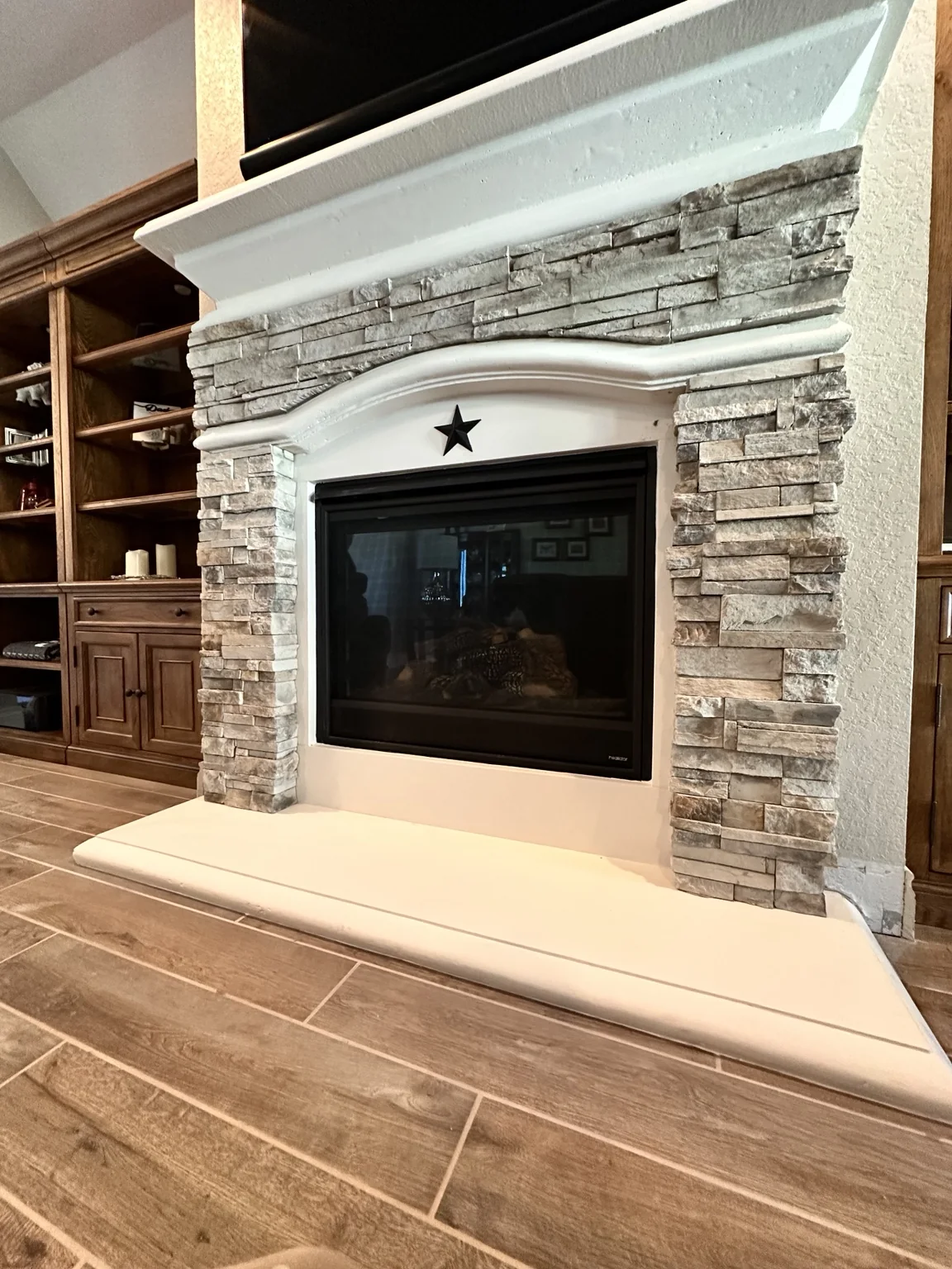Residential ledgestone fireplace resurfacing.