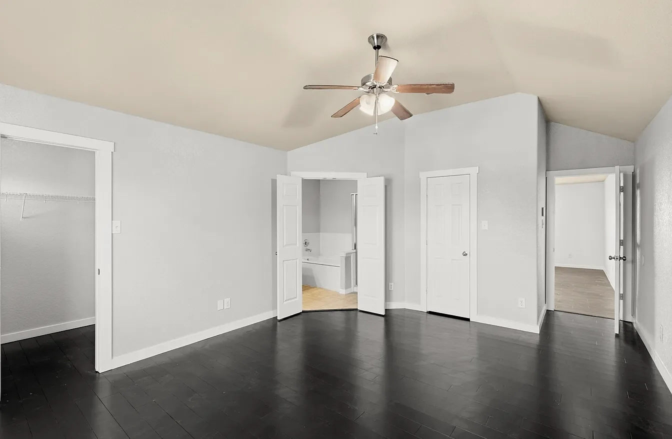 Black bamboo hardwood plank in the primary bedroom.