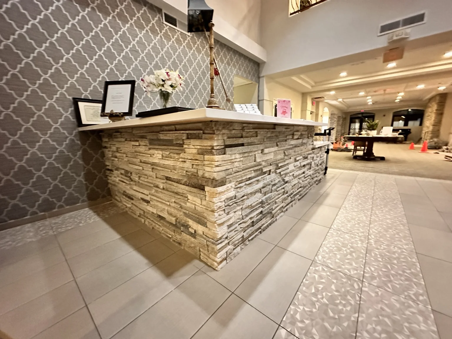 Phoenix, Arizona — architectural cultured-stone reception desk installation.
