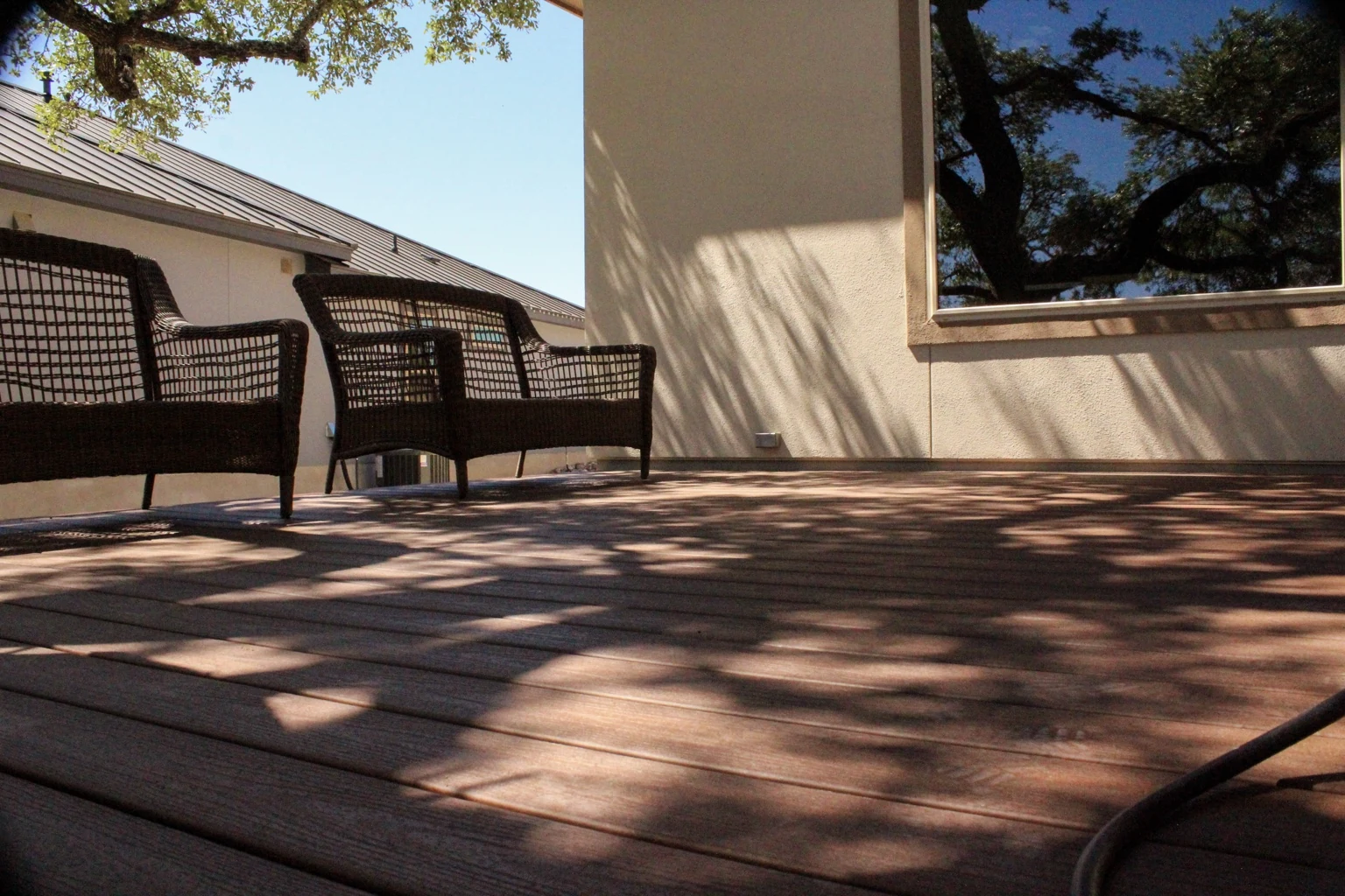 Finished composite deck surface and seating area.