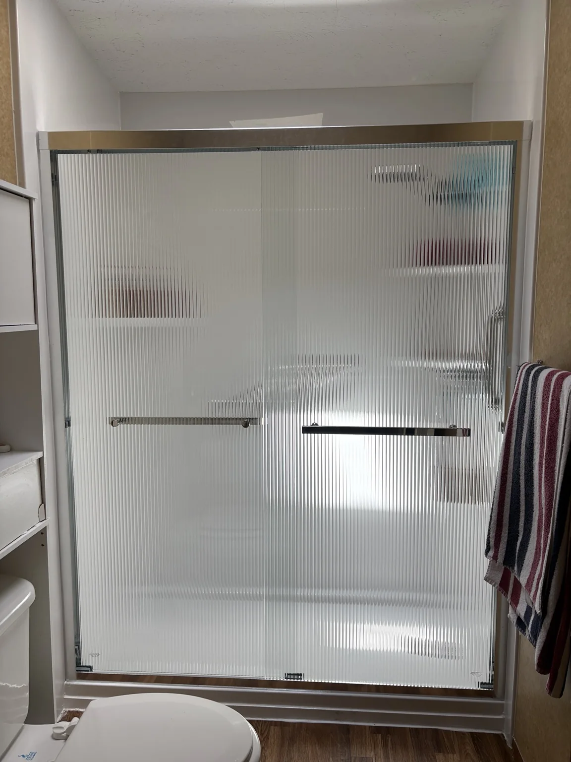 Shower enclosure installations